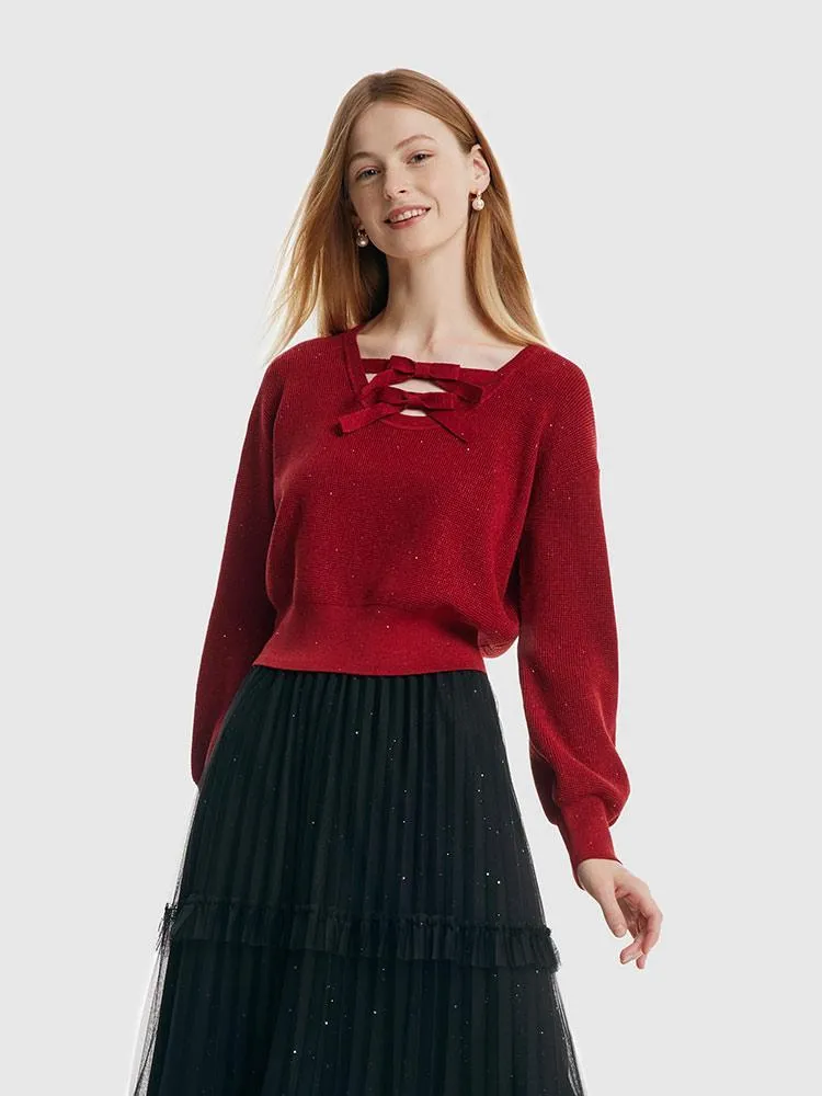 Pull femme en Tencel et laine à manches bouffantes et nœuds papillon