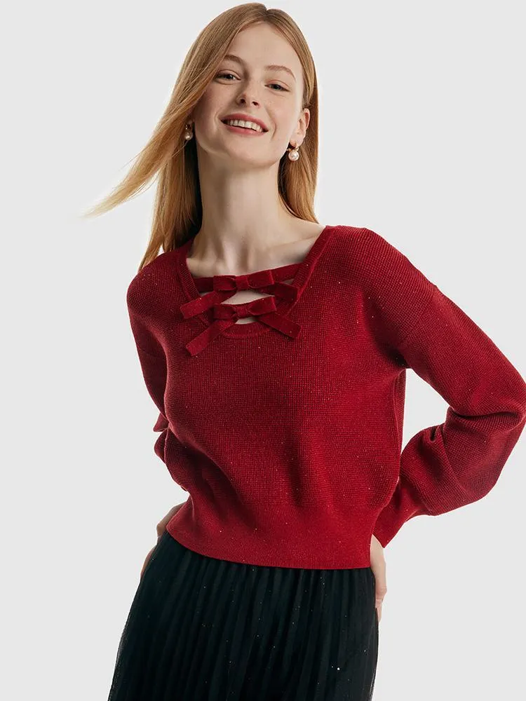 Pull femme en Tencel et laine à manches bouffantes et nœuds papillon