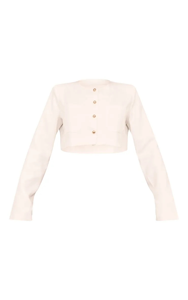 Veste courte style tailleur texturée blanche